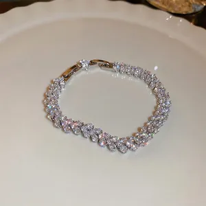 Luxury sparkling zircon paved bracelet in silver with a secure folding clasp for women