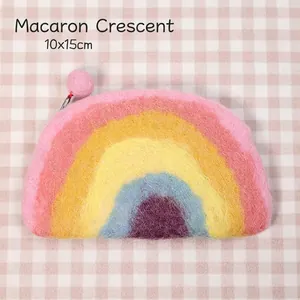 Detailed view of semi-circular rainbow wool felt coin purse with macaron color gradient
