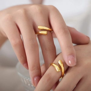 Minimalist gold open rings for couples with high polish mirror finish on hand