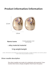 Detail view of irregular geometric gold earrings showing dimensions 2.1cm and 9.3g weight