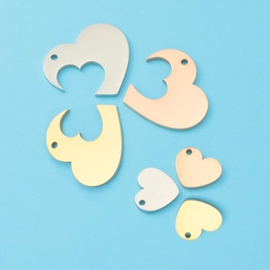 Polished stainless steel heart puzzle pendants in gold, silver, and rose gold finishes
