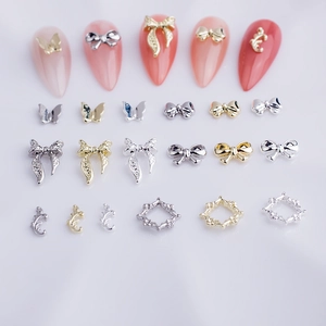 3D alloy butterfly bow nail art charms in gold and silver finish for manicure decoration