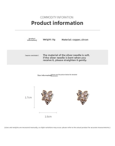 Detail view of gold clover earrings with cubic zirconia and exact size measurements
