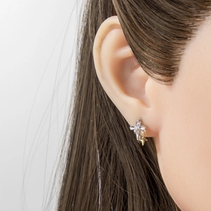 Minimalist star pendant hoop earrings in silver and gold dual-tone metal finish