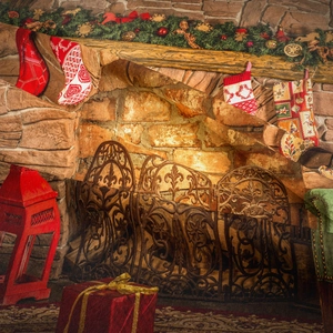 Detailed Christmas wall tapestry featuring a vintage stone fireplace and festive decor