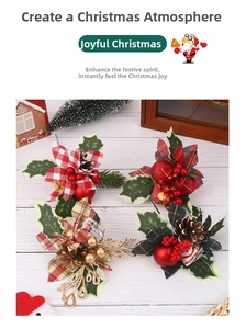Close-up of artificial Christmas picks with pine cones, red berries and plaid fabric