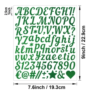 Close-up of 1-inch green glitter alphabet stickers featuring letters and numbers