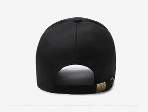 Close-up of black cotton baseball cap with adjustable bronze metal buckle and logo