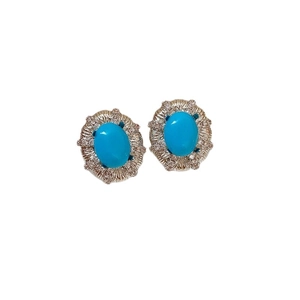 Orecchini a perno vintage con turchese ovale e aureola di diamanti su base argento