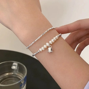 S925 silver double-layer bracelet with freshwater pearls and a small bell charm