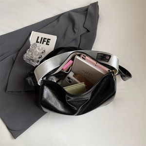 Chic black PU leather Boston bag with silver wide strap and soft pleated texture