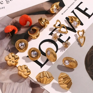 Collection of gold-plated earrings with mother-of-pearl floral and zircon drop designs