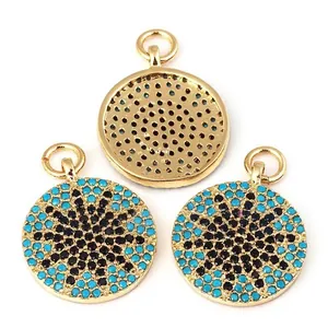 Gold-plated copper sunburst star pendants with blue crystals and honeycomb metal backing