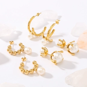French retro titanium steel C-shaped gold pearl earrings set on decorative white quartz