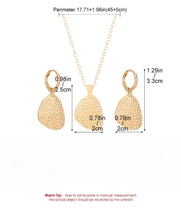 Detail view of gold alloy shell earring and necklace set with detailed size specifications