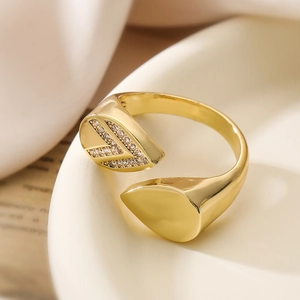 Golden open ring featuring a double leaf design with polished finish and pavé zircon stones