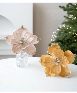 Detail of velvet magnolia flowers with gold glitter and beads for Christmas decor