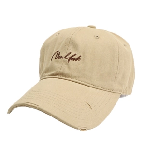 Vintage khaki baseball cap with New York embroidery and distressed ripped details