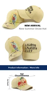 Detail of beige woven straw baseball cap featuring bird embroidery and Lauren lettering