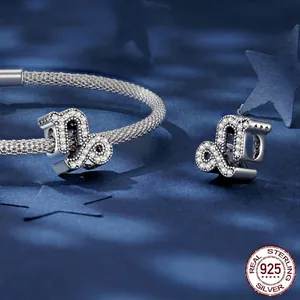 S925 sterling silver Capricorn zodiac charm with sparkling cubic zirconia on a mesh bracelet
