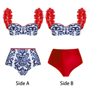 Detail view of two-piece bikini featuring blue Majolica print and red floral accents