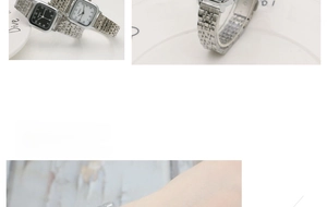 Detailed view of NAIDU square steel watch with silver metal mesh band and minimal dial