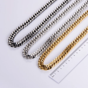 Polished 18k gold, silver and black stainless steel Cuban link chains in 12mm width