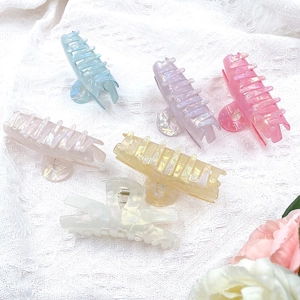 Set of 6 large laser acrylic hair claws in pearl colors including blue, pink and yellow