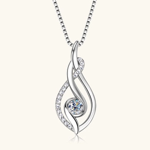 Close-up of S925 sterling silver twist pendant with emerald cut stone and micro-pave