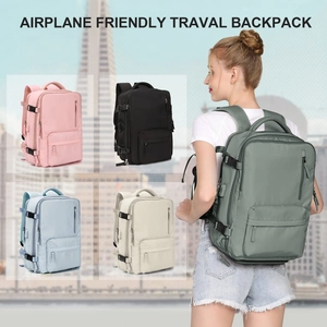 Airplane friendly travel backpack set in five colors including green, pink, and black