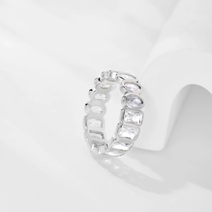 Macro shot of S925 sterling silver ring showing precise hallmark and sparkling zircons