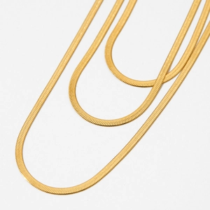 Three-layer gold stainless steel flat snake chain necklace with layered minimalist style