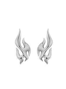 Detail of silver flame-shaped earrings with a high-polished mirror finish surface