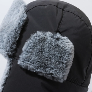 Winter windproof trapper hat with black shell and grey faux fur ear flaps for warmth