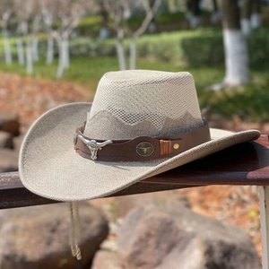 Western straw cowboy hat with bull head leather band and breathable hollow top design