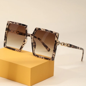 Vintage oversized square leopard sunglasses with brown gradient lenses and gold chain detail