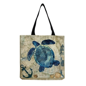 Linen tote bag featuring a blue sea turtle and vintage maritime map illustration