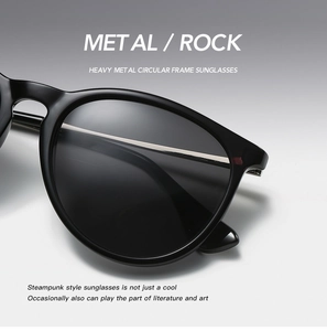 Detail shot of steampunk round sunglasses with metal frames and rock-style dark lenses