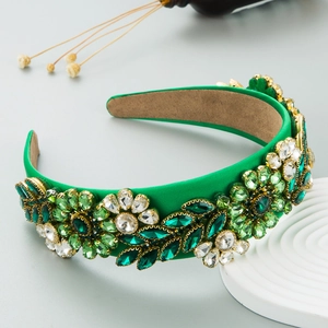 Baroque green satin headband with emerald crystal embellishments in a floral pattern