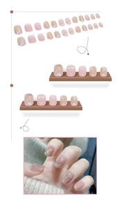Pink press-on nails with 3D bows and gold glitter details shown in display and on hand