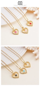 Detail showing various colors of heart-shaped pendants with zircon inlay on gold chains
