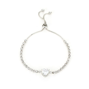Detail of adjustable silver heart bracelet with sparkling clear zircon stones