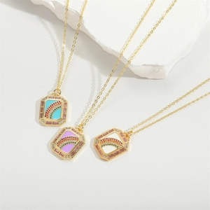 Rainbow pendant necklace in gold finish with colorful zircon stones on white stone base