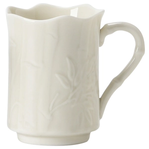Elegant white ceramic coffee mug with embossed bamboo design and bamboo joint handle