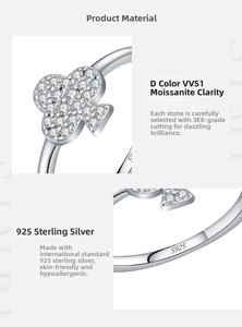 Detail of S925 sterling silver ring with clover moissanite pave setting and metal stamp