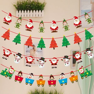 Christmas paper bunting featuring Santa, elves, and trees for festive home window decoration