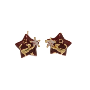 Star-shaped gold plated red enamel earrings featuring a golden cat and zircon crystals