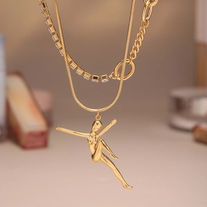 Gold layered necklace featuring a dancing girl pendant and sparkling zircon accents