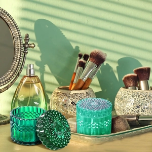 Set of 2 vintage embossed diamond pattern glass storage jars in dark and light green