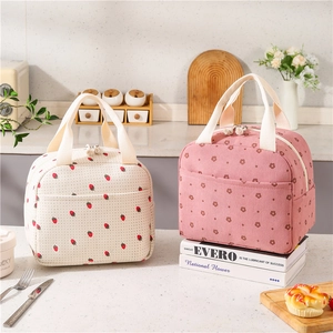 Borsa termica portatile in velluto a coste con motivi a fragole e fiori e tasca frontale